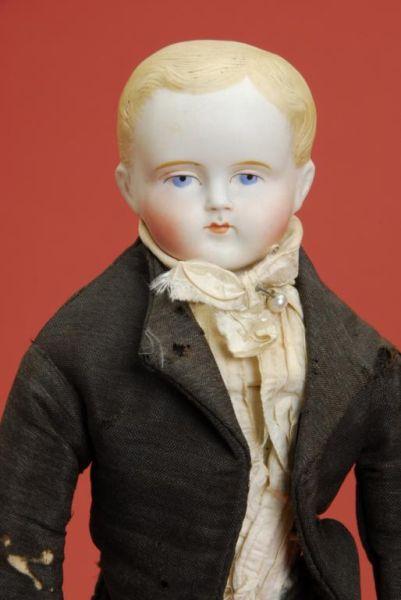 Appraisal: All Original Parian Boy with Tuxedo Germany ca untinted bisque