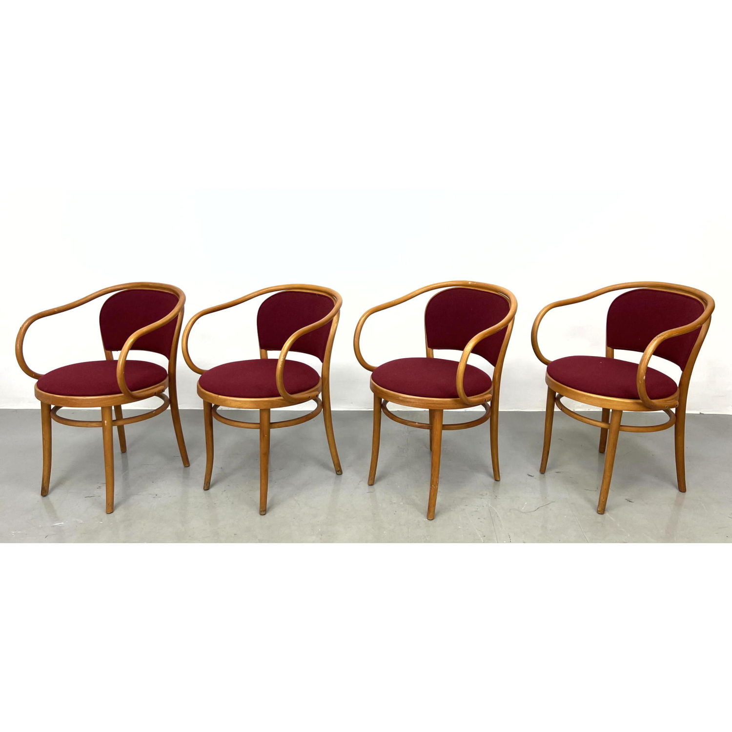 Appraisal: Set THONET Bentwood Arm Chairs Elegant form with Red Wine