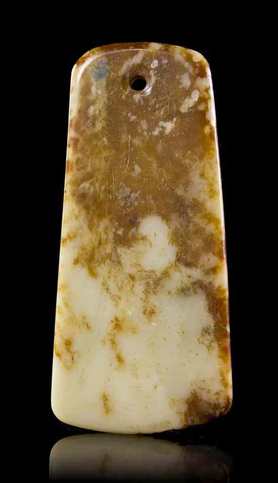 Appraisal: A Mottled Jade Plaque of russet and white stone of