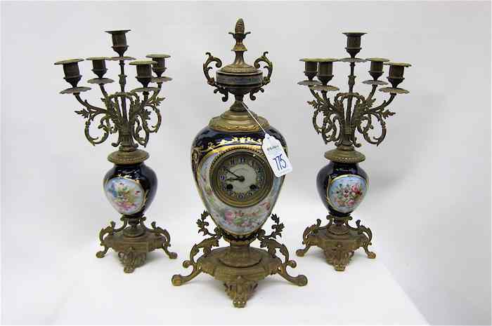 Appraisal: FRENCH ''SEVRES'' THREE PIECE CLOCK SET The centerpiece clock with