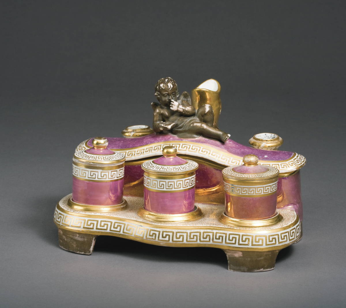 Appraisal: CONTINENTAL PINK LUSTRE AND GILT-DECORATED INKSTAND CIRCA - The cover