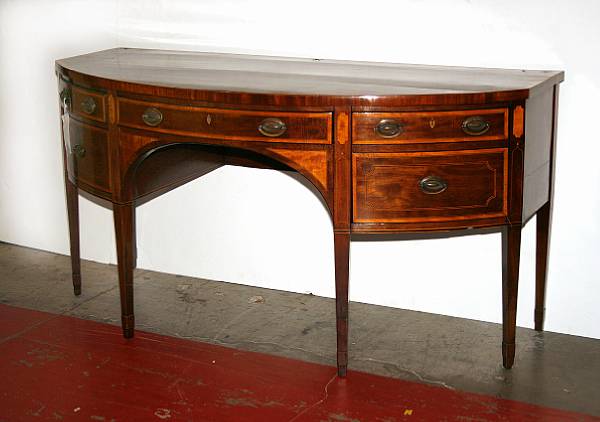 Appraisal: A George III satinwood inlaid brass mounted mahogany buffet third