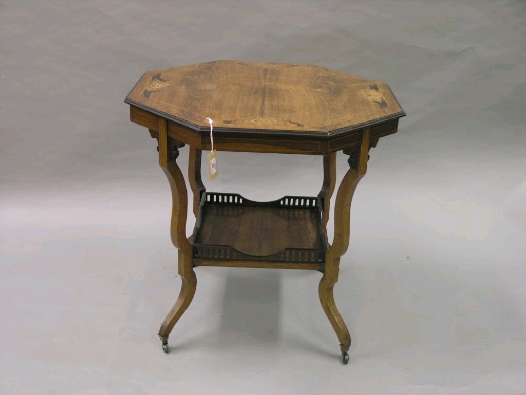 Appraisal: A late Victorian inlaid rosewood centre table octagonal shape with