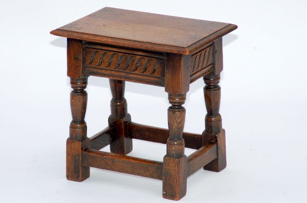 Appraisal: English stool Pegged construction and carved skirt Oak English th