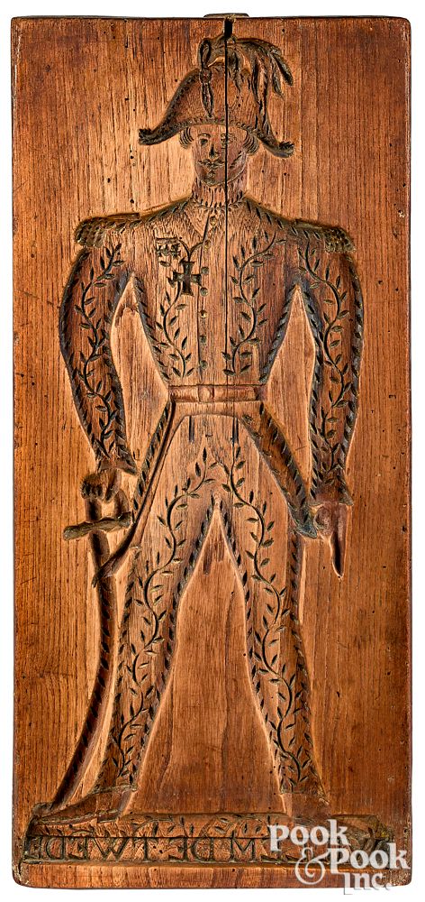 Appraisal: Dutch carved oak cakeboard th c with double s Dutch