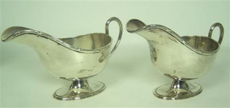 Appraisal: A pair of modern sauceboats Asprey Company Ltd London of