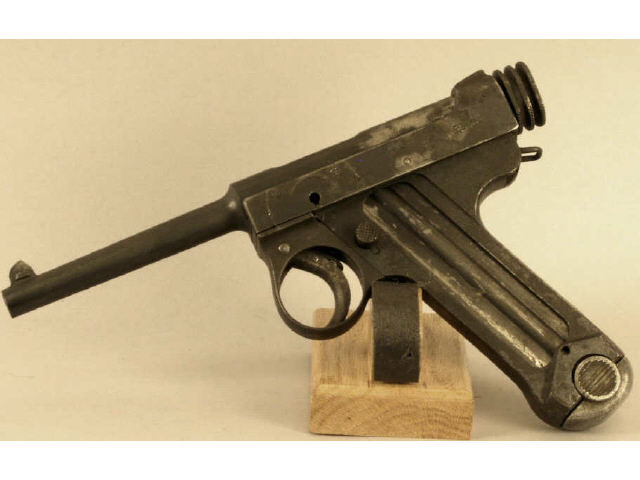 Appraisal: WWII era Japanese Nambu parts pistol with magazine Estimate -