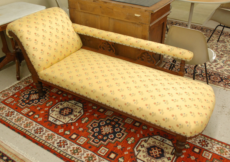 Appraisal: VICTORIAN CARVED AND UPHOLSTERED CHAISE LOUNGE English late th century