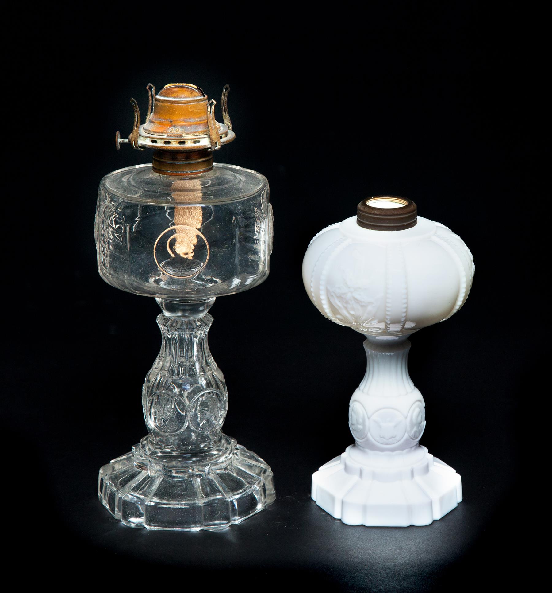 Appraisal: TWO COLUMBIA COIN GLASS OIL LAMPS Made on the grounds