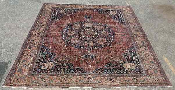 Appraisal: Room size Persian oriental carpet overall floral patterns and blue