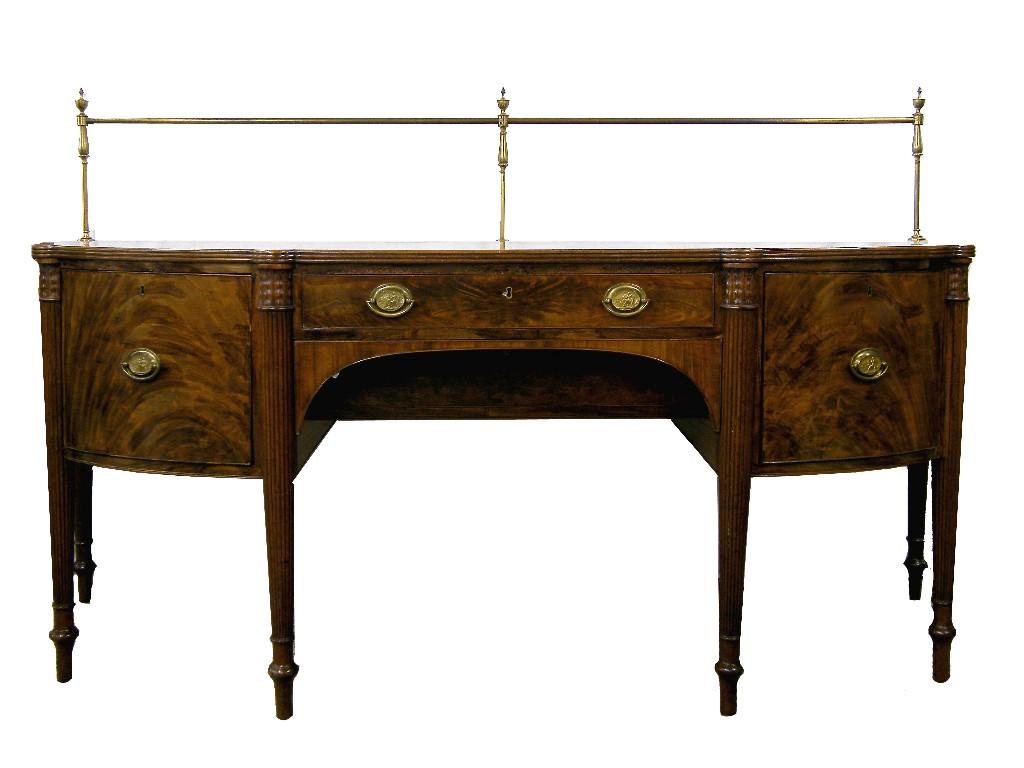 Appraisal: Impressive Regency style mahogany bowfront sideboard the brass railed back