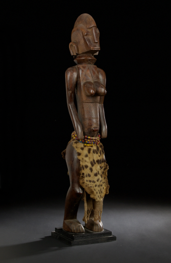 Appraisal: African Carved Wooden Figure of a Female of elongated form