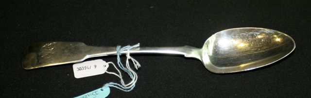 Appraisal: An Irish sterling silver fiddle pattern serving spoon Dublin