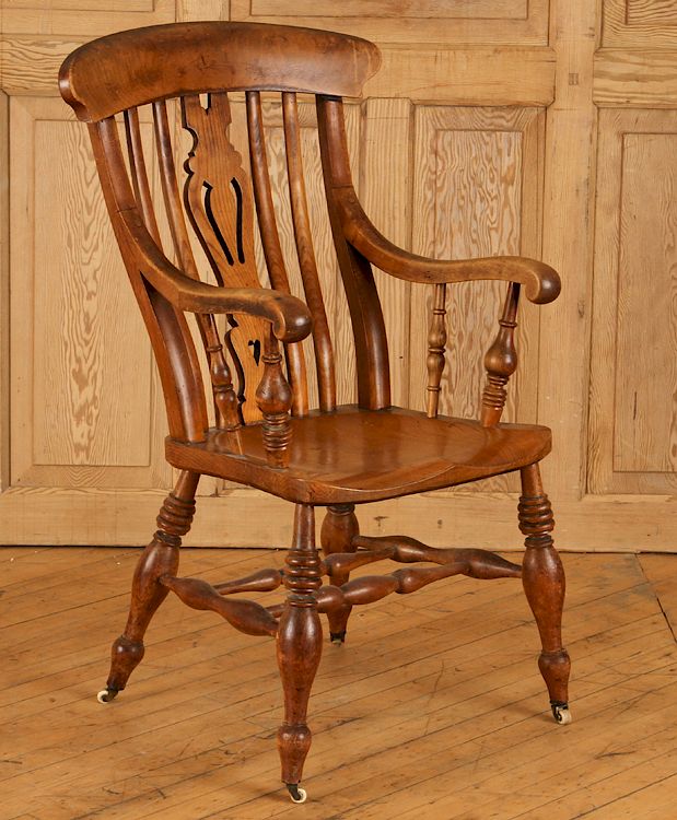 Appraisal: TH CENTURY ELM OPEN ARM CHAIR A nineteenth century elm