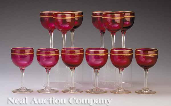 Appraisal: A Set of Twelve Bohemian Ruby Gilt Banded and Etched