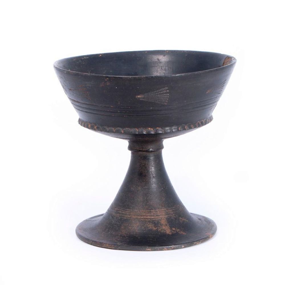 Appraisal: Etruscan Chalice A black painted Etruscan pottery chalice circa th