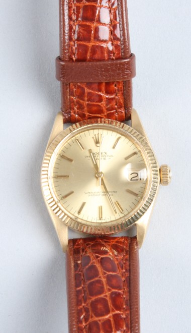 Appraisal: KY gold Rolex watch stamped K Leather band gold dial