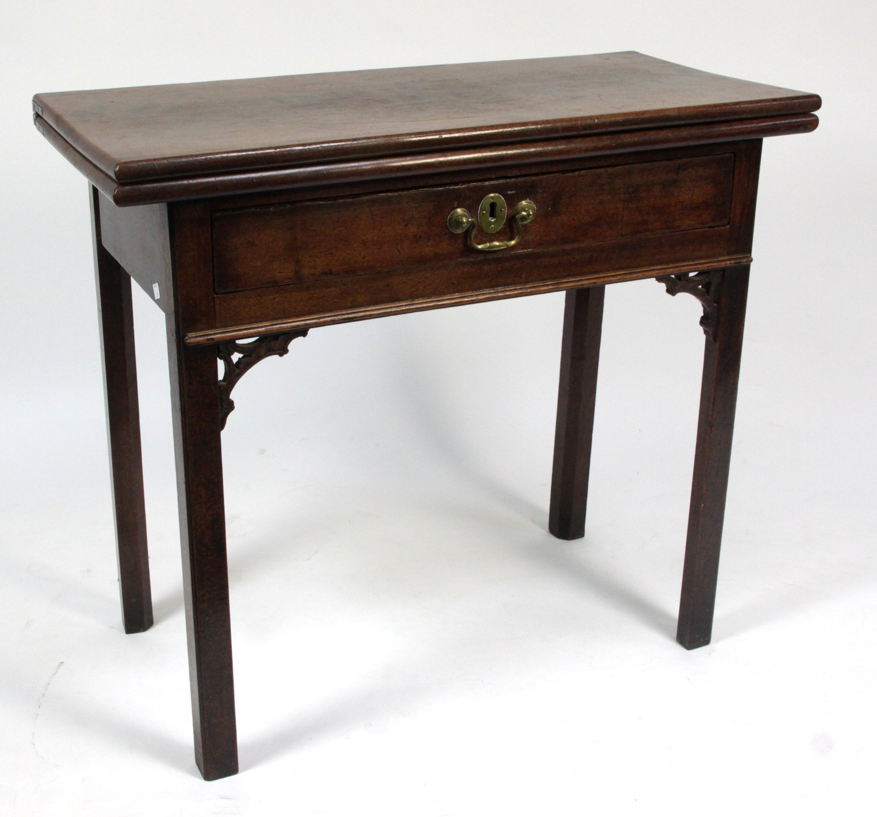 Appraisal: A George III mahogany tea table fitted a drawer to