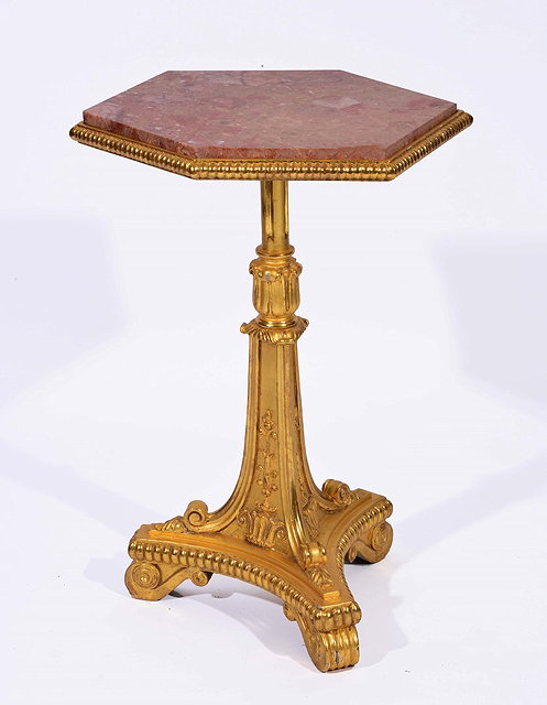 Appraisal: A GEORGE III GILTWOOD TABLE with hexagonal top scroll splay