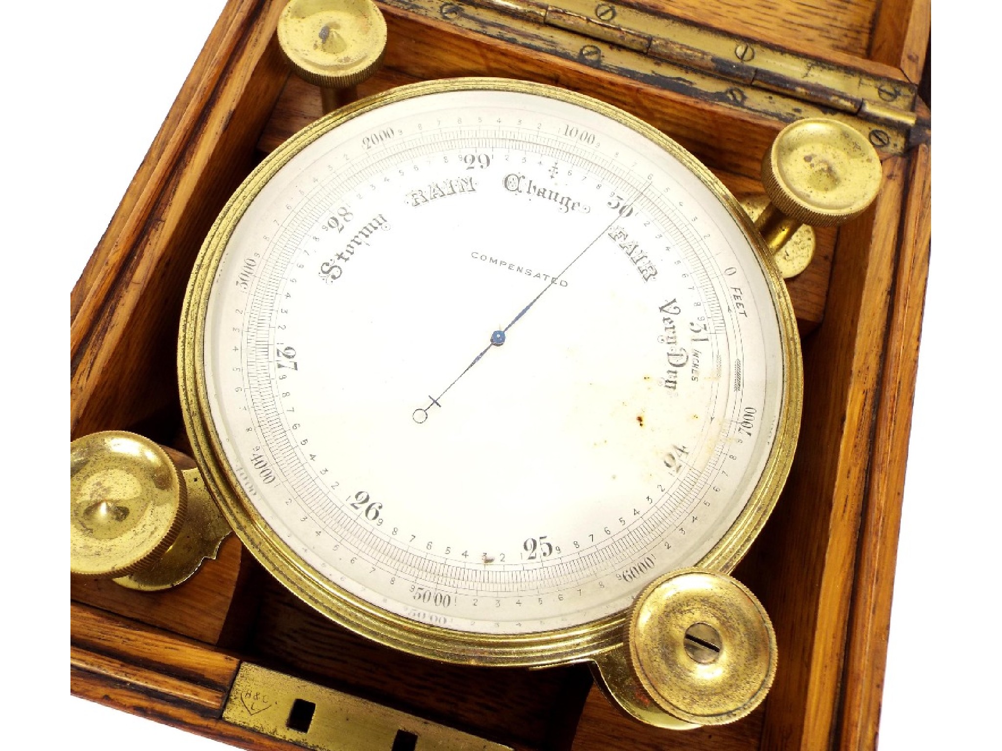 Appraisal: Oak cased ship's compensated barometer the silvered dial within a