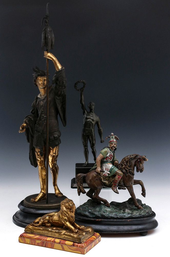 Appraisal: A COLLECTION OF UNUSUAL SPELTER FIGURES The taller being both