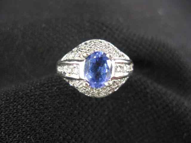 Appraisal: Tanzanite Diamond Ring oval gem weighing carat surrounded by diamonds