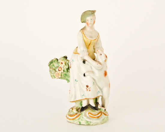 Appraisal: Staffordshire Figure of Woman and Dog H