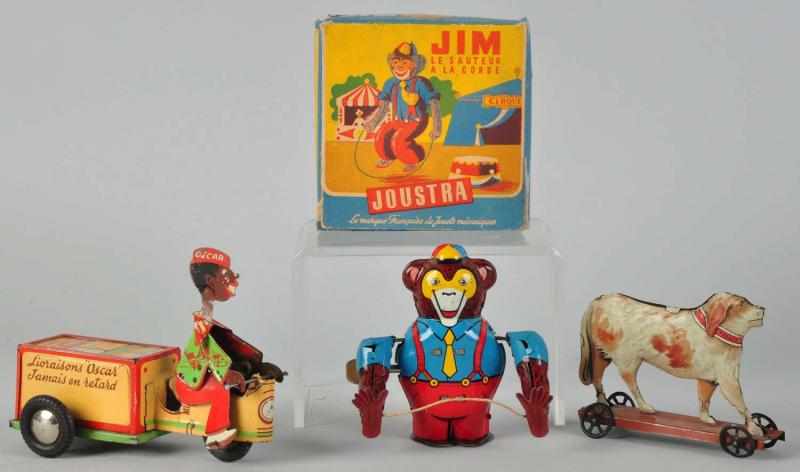 Appraisal: Lot of Tin Litho Toys French Includes one Jim the