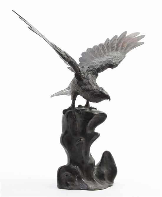 Appraisal: A Japanese Bronze Figure of a Hawk the bird of