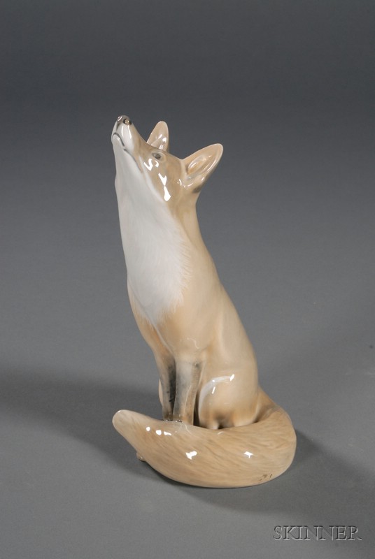 Appraisal: Royal Copenhagen Porcelain Fox c the seated figure molded gazing