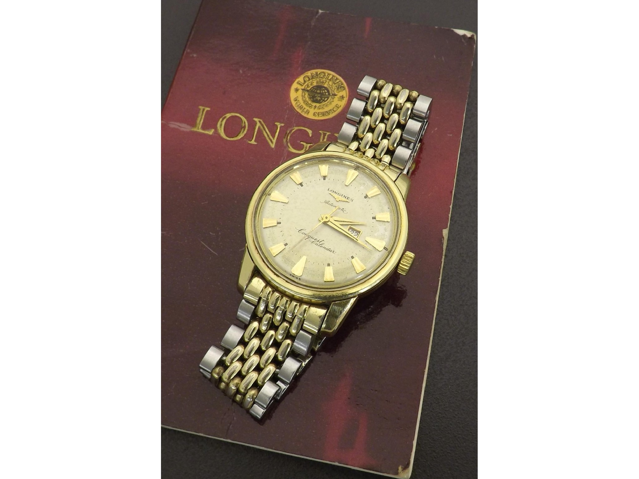 Appraisal: Longines Conquest Calendar automatic gold plated and stainless steel gentleman's