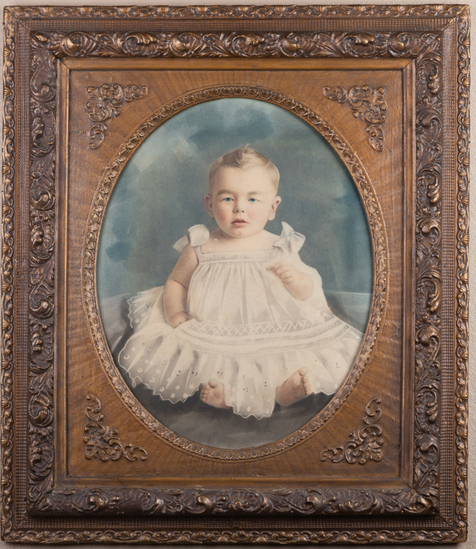 Appraisal: Beautiful hand tinted photograph of baby in antique Frame circa