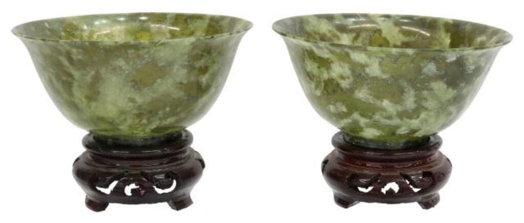 Appraisal: lot of Chinese carved green hardstone bowls having flared rim