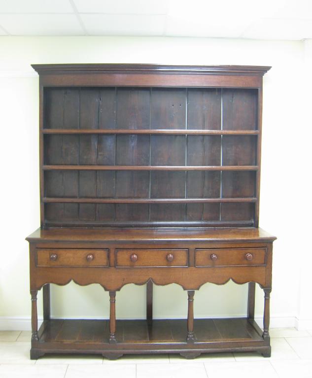 Appraisal: An th Century Montgomeryshire oak Dresser having boarded rack the