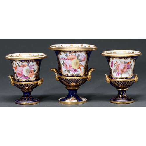 Appraisal: A Coalport garniture of three vases c painted in Worcester