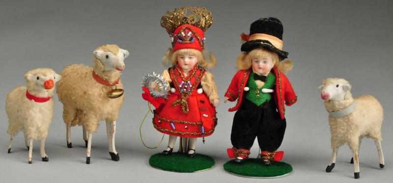 Appraisal: Lot of All Bisque Dolls and Sheep Description German bisque