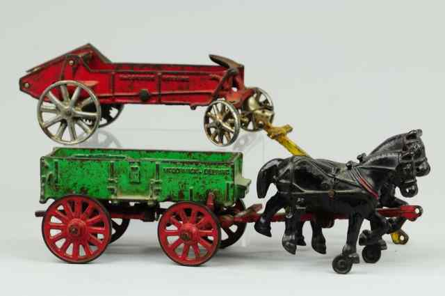 Appraisal: ARCADE HORSE DRAWN WEBER WAGON AND MANURE SPREADER Cast iron