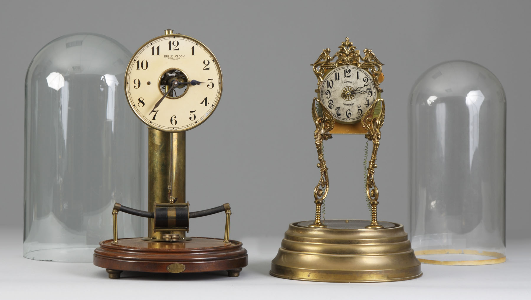 Appraisal: Bulle Early Battery Clock Walnut base brass frame with dome