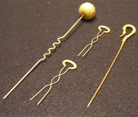 Appraisal: JEWELRY Two K yellow gold hair pins Two K yellow