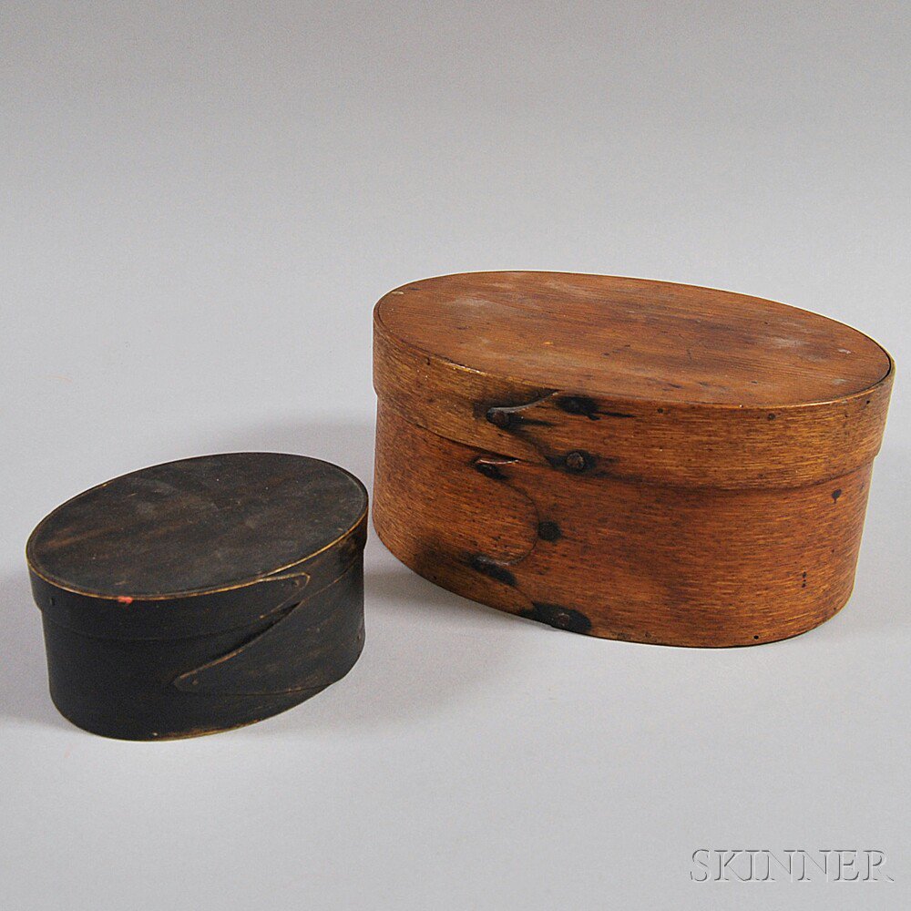 Appraisal: Two Oval Covered Boxes America th century a small black-painted