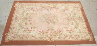 Appraisal: Aubusson Carpet The central floral cartouche with scrolling berry and