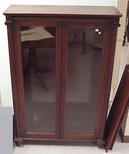 Appraisal: Bookcase American th C double glazed doors flanked by Ionic