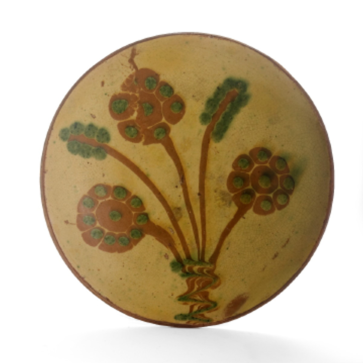 Appraisal: PENNSYLVANIA SLIP-DECORATED REDWARE PLATE NINETEENTH CENTURY Decorated with a flower