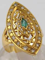 Appraisal: A yellow metal tests carat gold emerald and diamond marquise