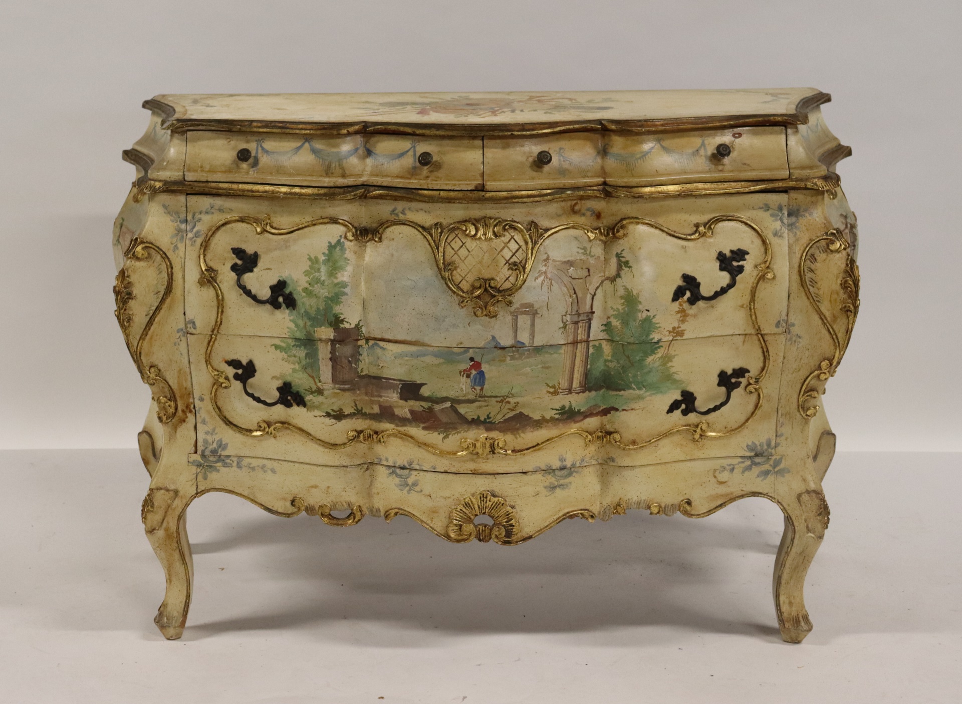 Appraisal: ANTIQUE PAINT DECORATED ITALIAN COMMODE Serpentine front Bombe Finely hand