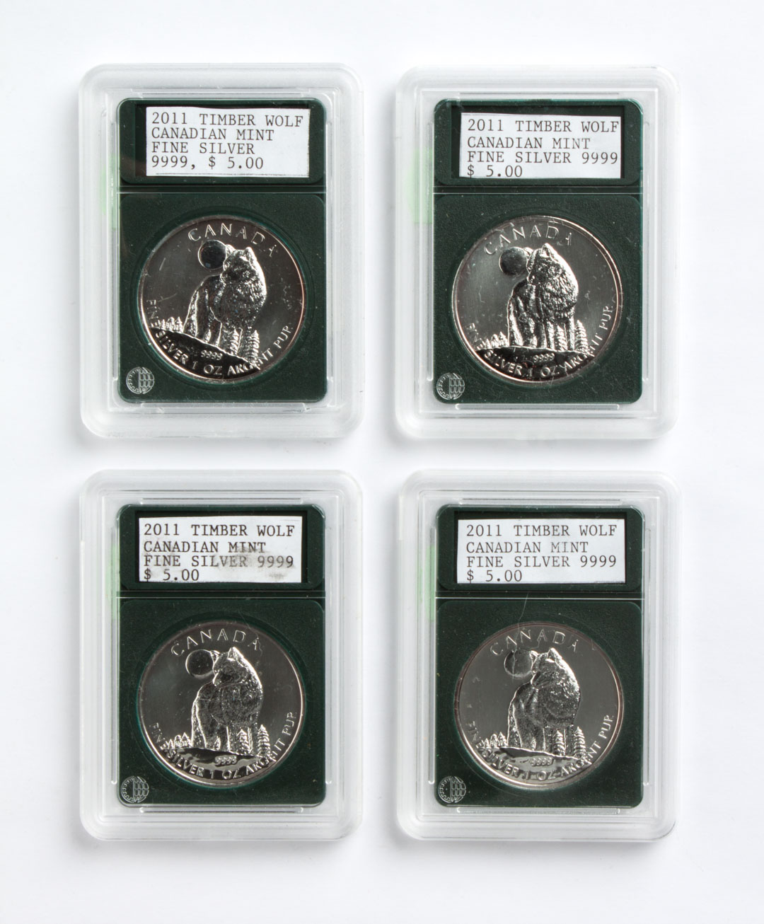 Appraisal: Four Canada Timber Wolf silver bullion coins Prooflike Brilliant Uncirculated