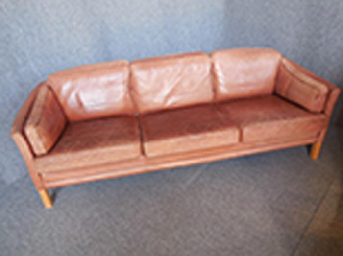 Appraisal: MOGENS HANSEN DANISH BORN BROWN LEATHER THREE-SEAT SOFA back length