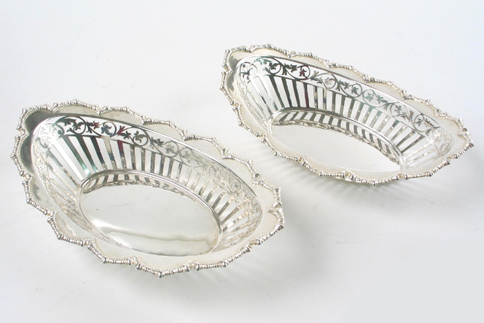 Appraisal: PAIR OF ENGLISH VICTORIAN HALLMARKED STERLING SILVER PIERCED BOWLS London