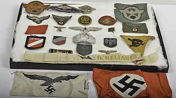 Appraisal: German WWII Colth And Metal Insignia Lot of Twenty-Four Lot