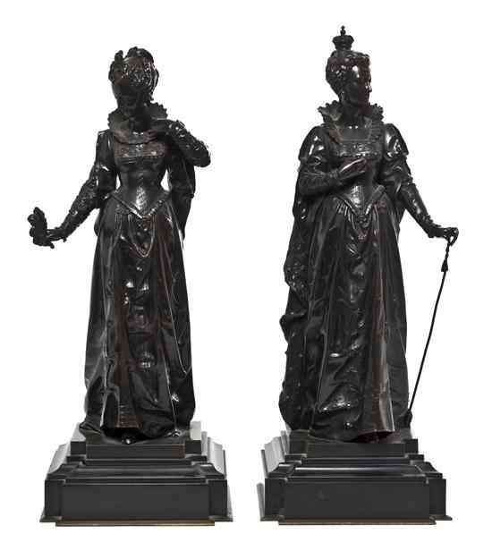 Appraisal: A Pair of Patinated Bronze Figures th century depicting two